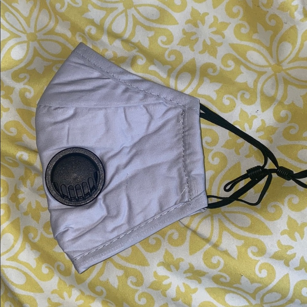 Brand new light grey mask face